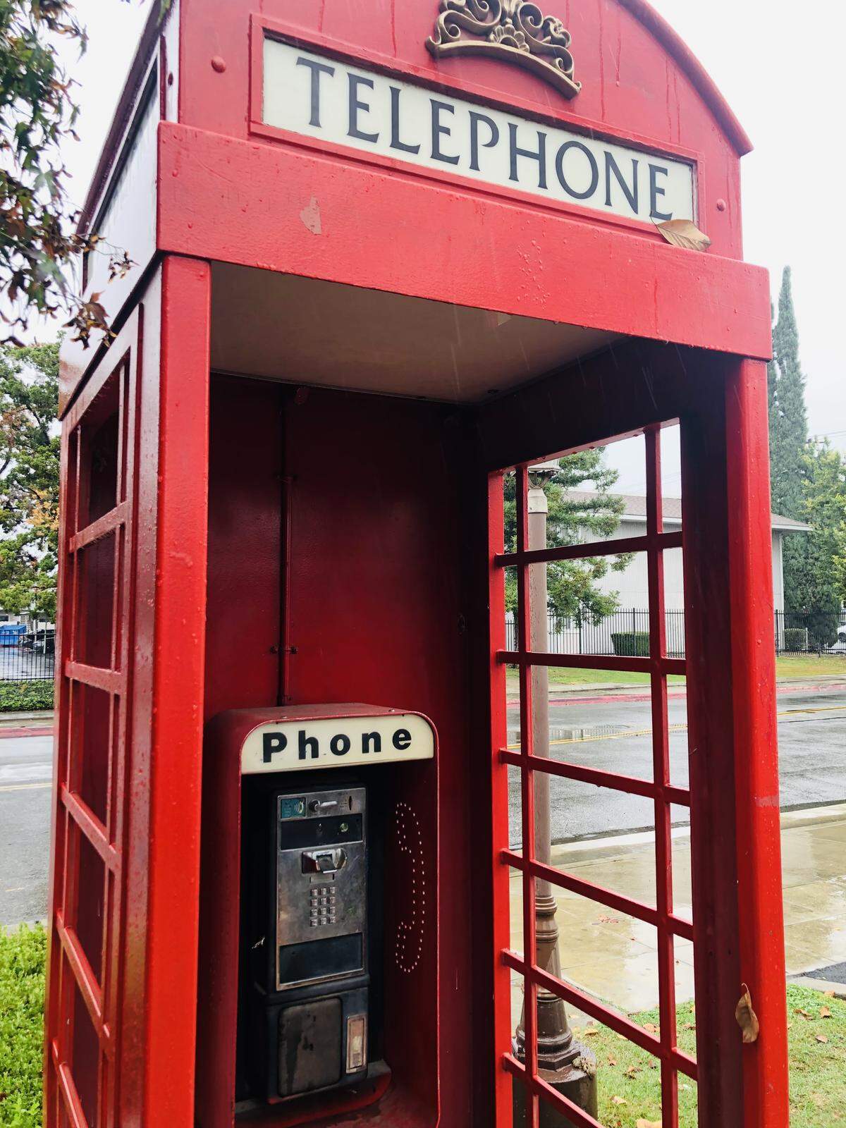 The payphones inside the two London red telephone booths located across from the Fresno State campus were destroyed a few years back and the line disconnected. However, the booths still regularly draws people who want to take a photo next to it.