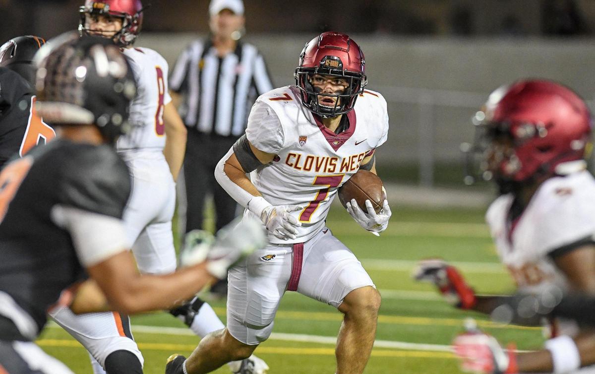 Clovis West running back Aidan Fortenberry looks for an opening on a run against Central during their football game at Deran Koligian Stadium on Friday, Oct. 21, 2022.