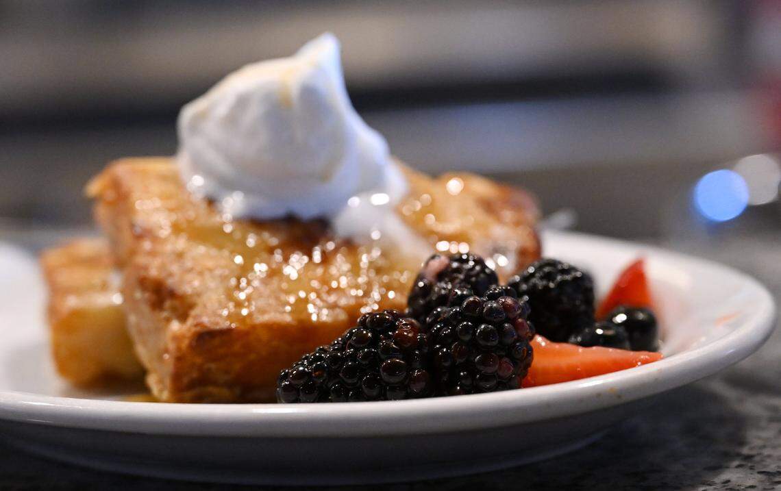 Fresh blackberries alongside Bread Pudding at Vatche Moukhtarian's new Cracked Pepper Cafe, photographed Tuesday, March 10, 2026 in Fresno.