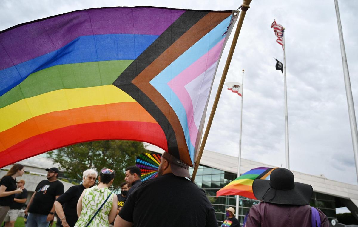 A coalition of LGBTQ-friendly groups gather outside Fresno City Hall to show solidarity Wednesday, June 22, 2022 in Fresno.