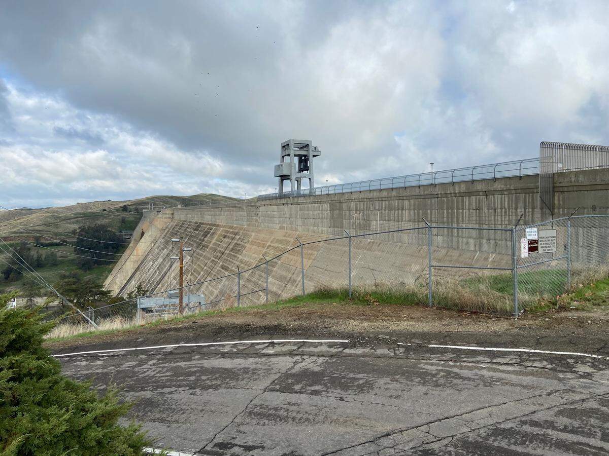 Friant Dam near Fresno, California, as seen from the visitors center area that is maintained by the Bureau of Reclamation but seldom sees any visitors. Access from Millerton Road and the Millerton Lake State Recreation Area has been gated shut since 9/11.