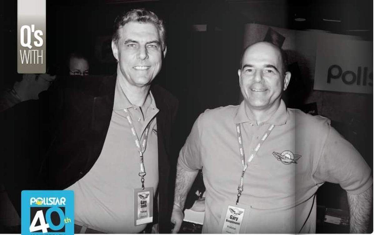 In an undated photo submitted by Pollstar, Gary Smith, left, is shown with Gary Bongiovanni inside the music industry trade publication they founded in 1981.