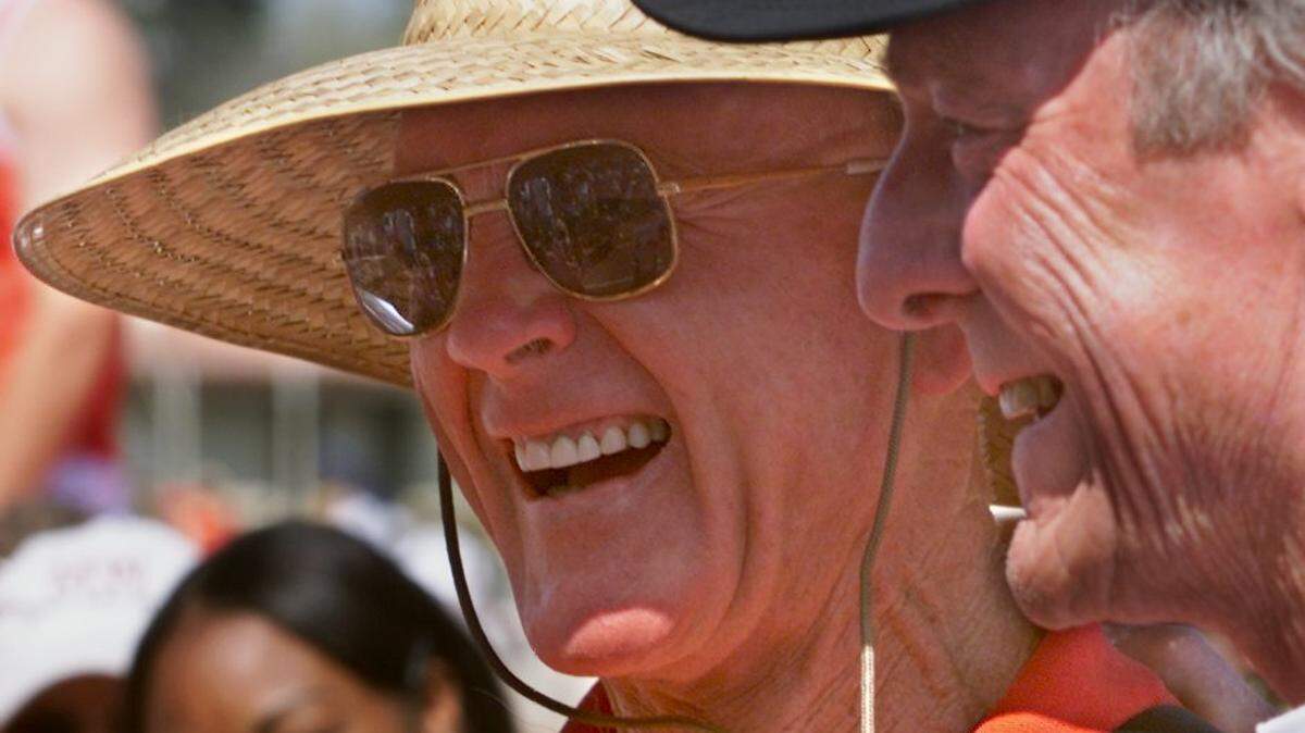 Fresno State track coach Red Estes shares a laugh with Olympic legend Bob Mathias, right, during a retirement ceremony for the longtime Bulldogs coach during the Bob Mathias Fresno Relays on April 1, 2000.
