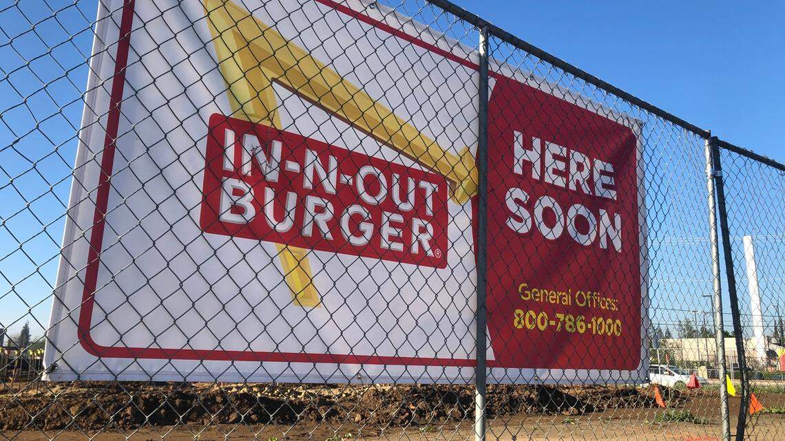An In-n-Out Burger sign was displayed on a chain-link fence earlier this month in the Fancher Creek Town Center, indicating the structure that’s being built a few hundred yards from what appears to be the front entrance of the upcoming Target. Both Target and In-N-Out project to open around October.