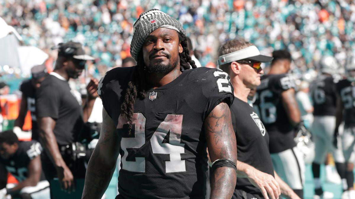 Oakland Raiders running back Marshawn Lynch walks the sideline during an NFL football game against the Miami Dolphins, Sunday, Sept. 23, 2018 in Miami Gardens, Fla. The Dolphins defeated the Raiders 28-20.