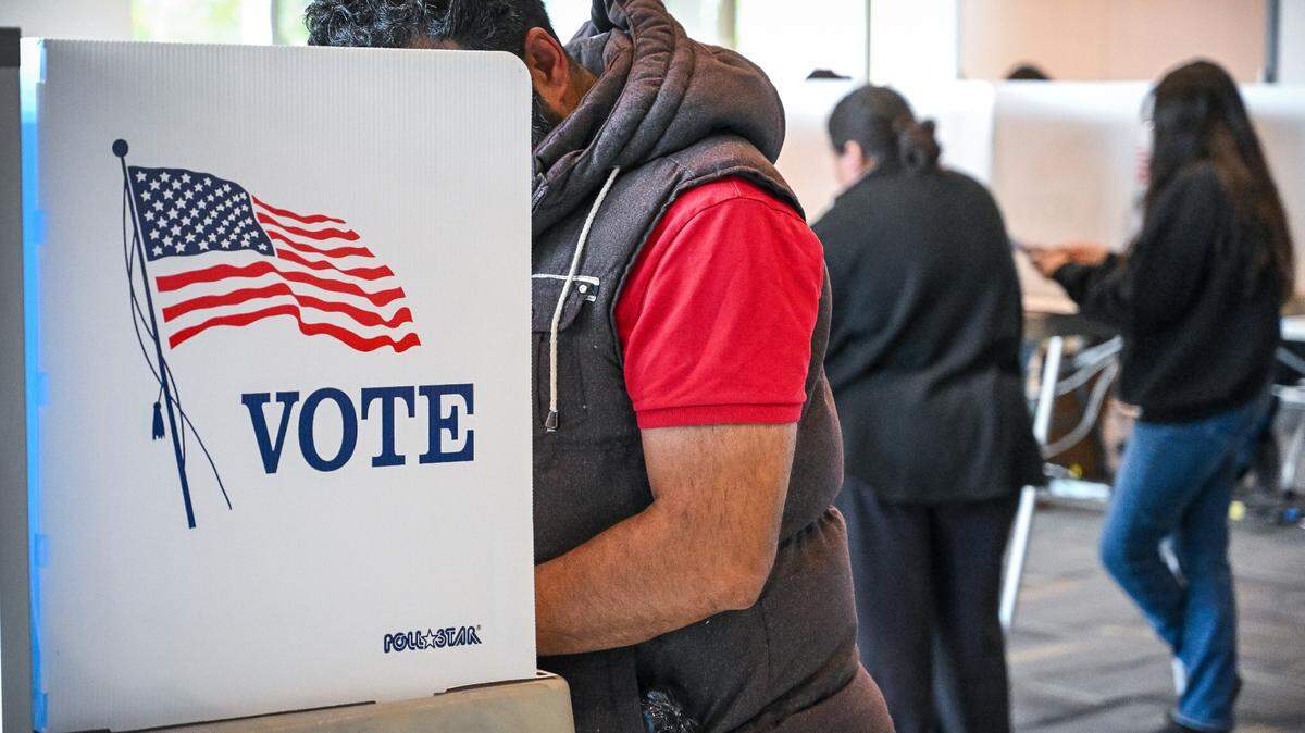 Voters mark their ballots at the Clovis Transit Center, a new permanent polling place that replaces its former location at Clovis City Hall, on Election Day, Tuesday, Nov. 5, 2024. 