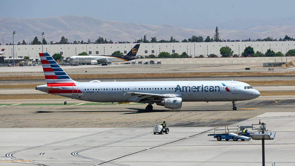 An American Airlines jet taxies outside the terminal at Yosemite International Airport photographed on Friday, June 7, 2024.