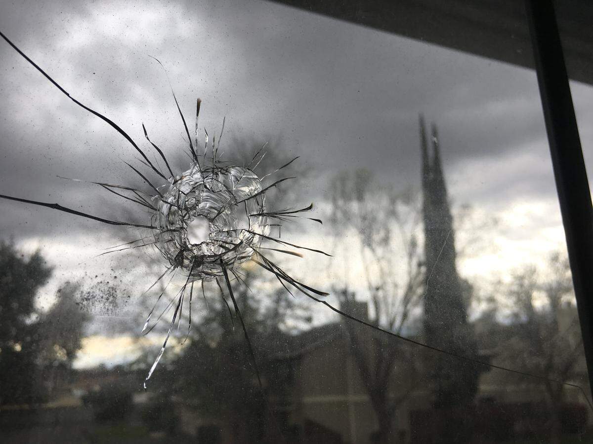 A large bullet hole pierced the window of a northeast Fresno apartment on Sunday, March 3, 2019, during what police believe is a random shooting. It sent bullets into the apartment and barely missed two roommates.