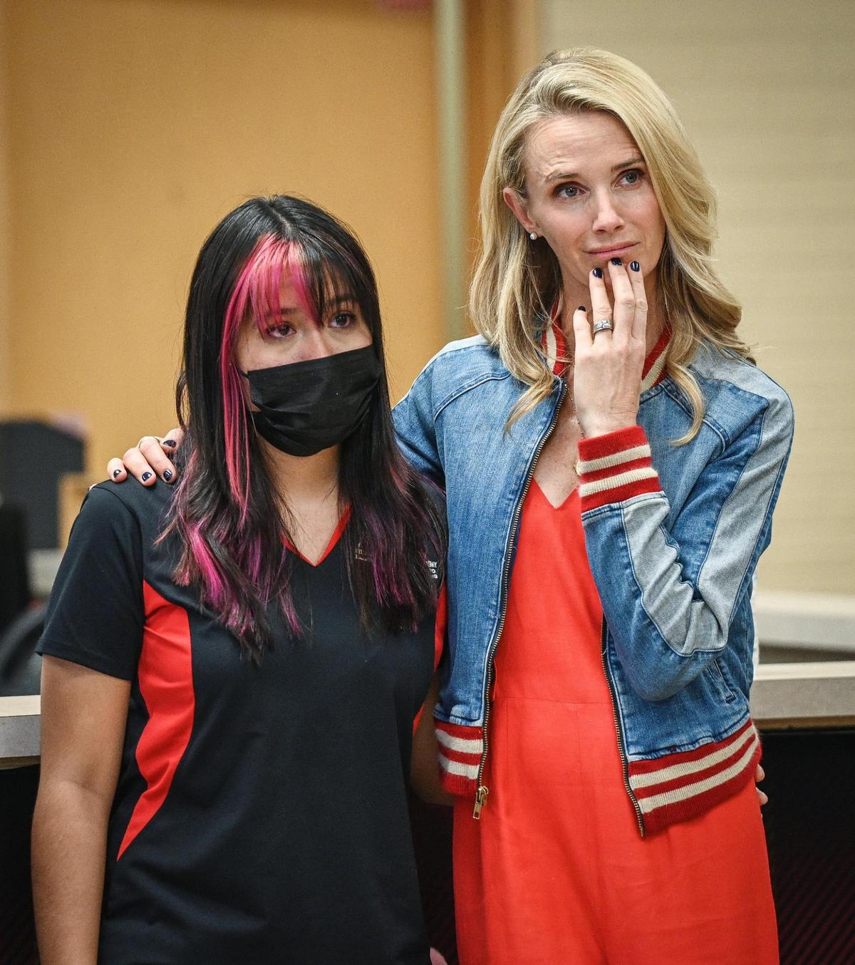 Jennifer Siebel Newsom, First Partner of California, supports McLane High School senior Aliyah Barajas, who shared her experiences with depression and self-harm in her youth, during a press conference where Gov. Gavin Newsom, announced new funding for mental health and substance abuse support for young Californians, at the school in Fresno on Thursday, Aug. 18, 2022.