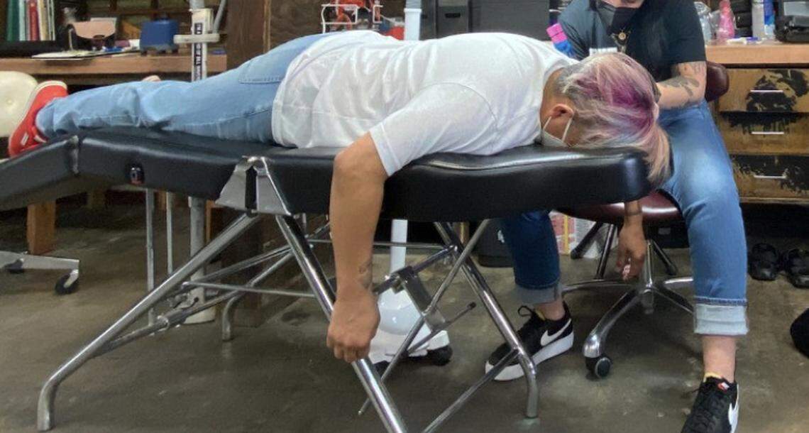 Bitwise co-CEO Irma Olguin Jr. gets a tattoo in tandem with a company employee.