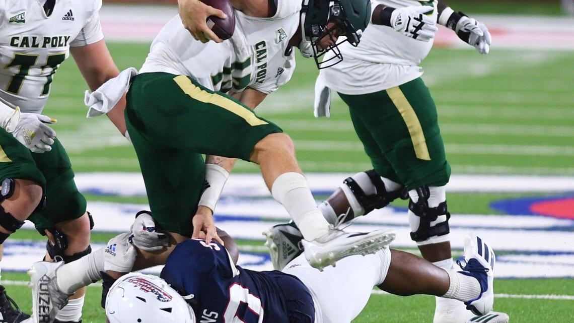 Fresno State defensive tackle Kevin Atkins sacks Cal Poly quarterback Spencer Brasch during the Bulldogs’ 63-10 victory over the Mustangs, Saturday, Sept. 11, 2021 in Fresno. Atkins had 2.0 sacks in the game.