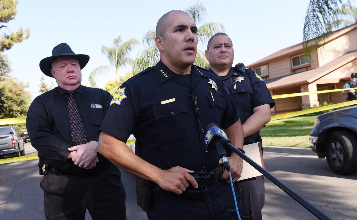 Fresno Police Chief Paco Balderrama, center, explains the details in a complicated case involving a carjacking and shooting which began in Selma and ended in Fresno on Saturday, Sept. 4, 2021.