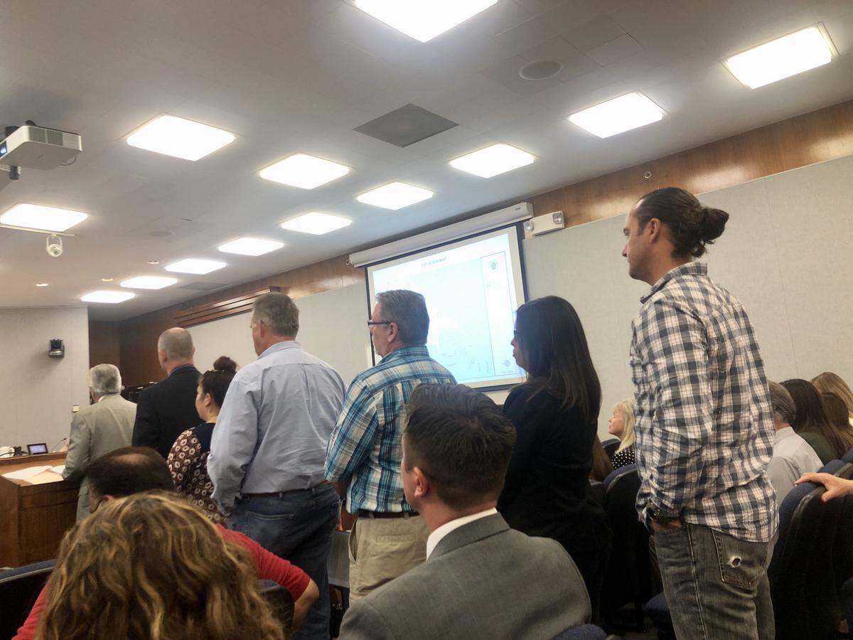 Supporters and opponents of a proposed privately-funded animal shelter filled the Fresno County Board of Supervisors chambers and spilled into the adjacent lobby and hallway on Tuesday, Sept. 11, 2018.