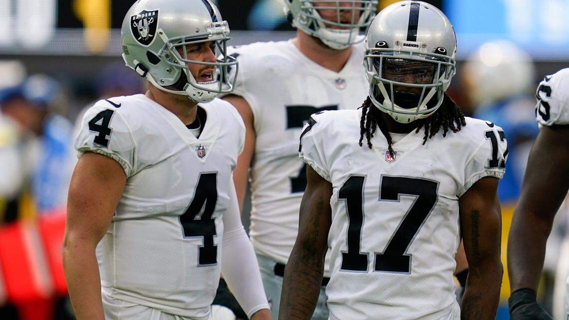 Las Vegas Raiders quarterback Derek Carr and wide receiver Davante Adams during of an NFL game against the Los Angeles Chargers, Sunday, Sept. 11, 2022, in Inglewood.