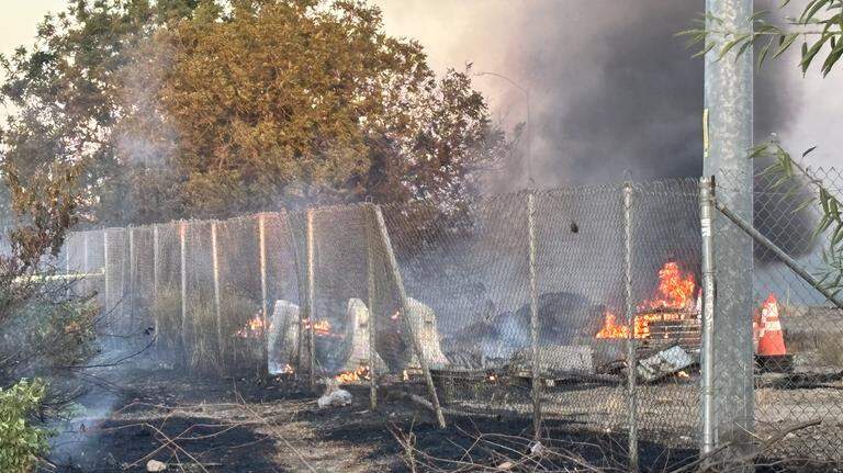 Arson investigators called after body found in Fresno grass fire near Hwy 41