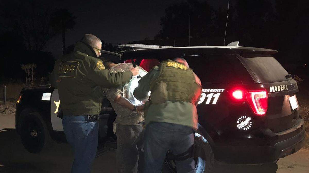 Members of a Madera County SWAT team arrest a suspect who allegedly shot a deputy during a domestic violence call on  Sunday, Nov 11, 2018.