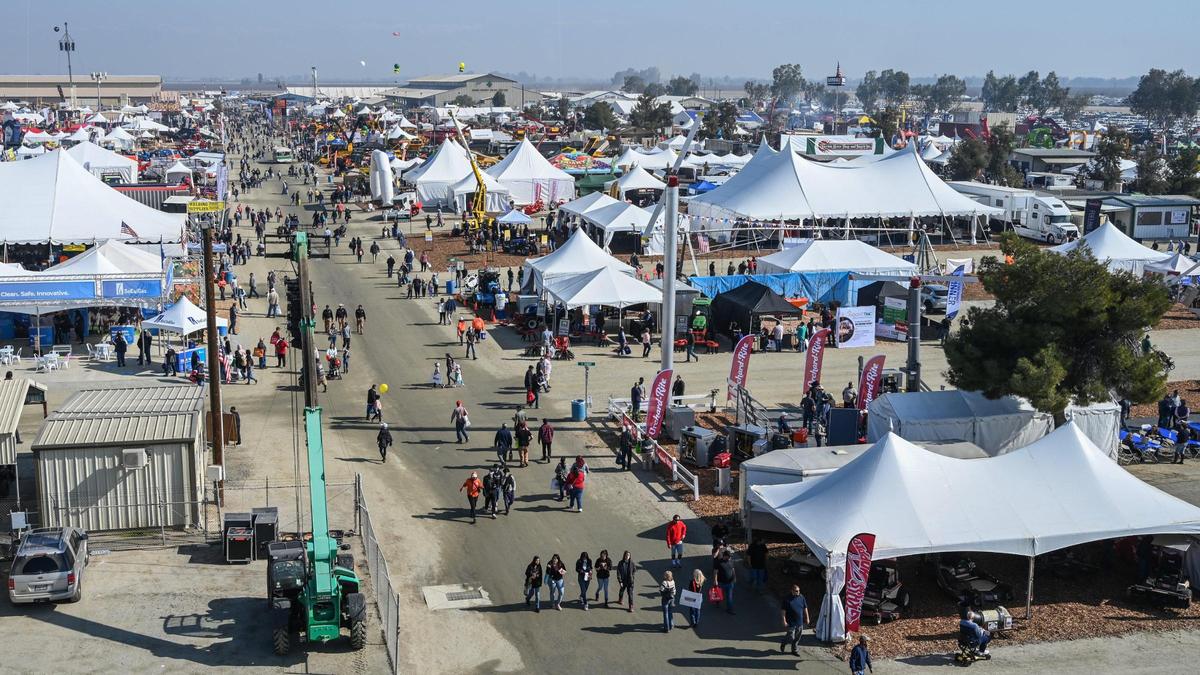 Farm show-goers are once again walking down Median Street in person at the World Ag Expo in Tulare on Tuesday, Feb. 8, 2022.