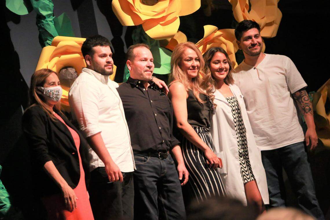 Sunniside High School valedictorian Gwendolyne Aguilar with her family and with Dr. Katherine A. Flores, director of the UCSF Fresno Latino Center for Medical Education and Research during the Doctors Academy’s end of the year ceremony on May 18.