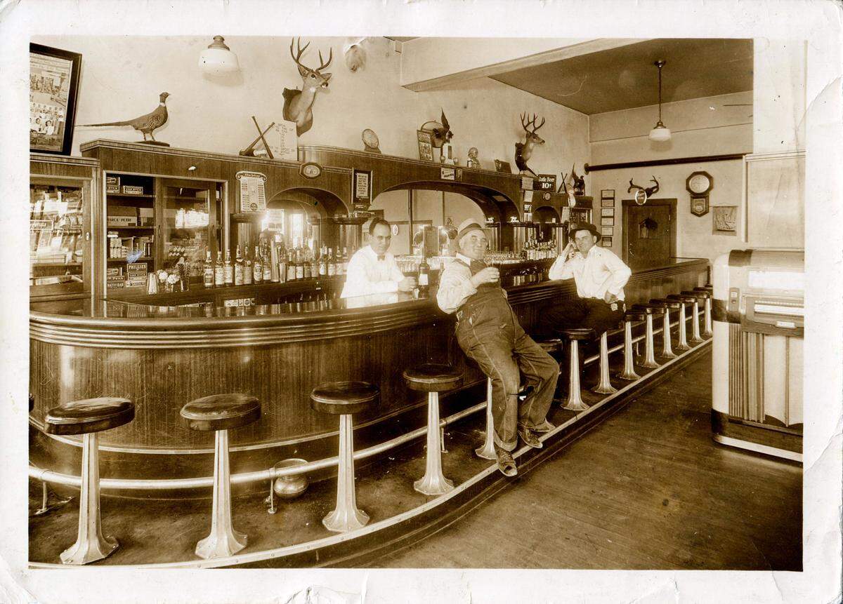 An undated photo courtesy of the Fresno County Historical Society was taken at the Cosmopolitan Tavern. The wooden back of the bar was moved to the new location a few years ago.
