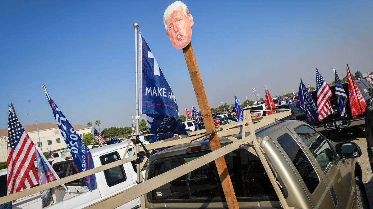 Devotion to Donald Trump, on display here at a Fresno truck rally, has been equated to membership in a cult. That’s a “shallow, rhetorical” label, writes Cal Poly religious studies professor.