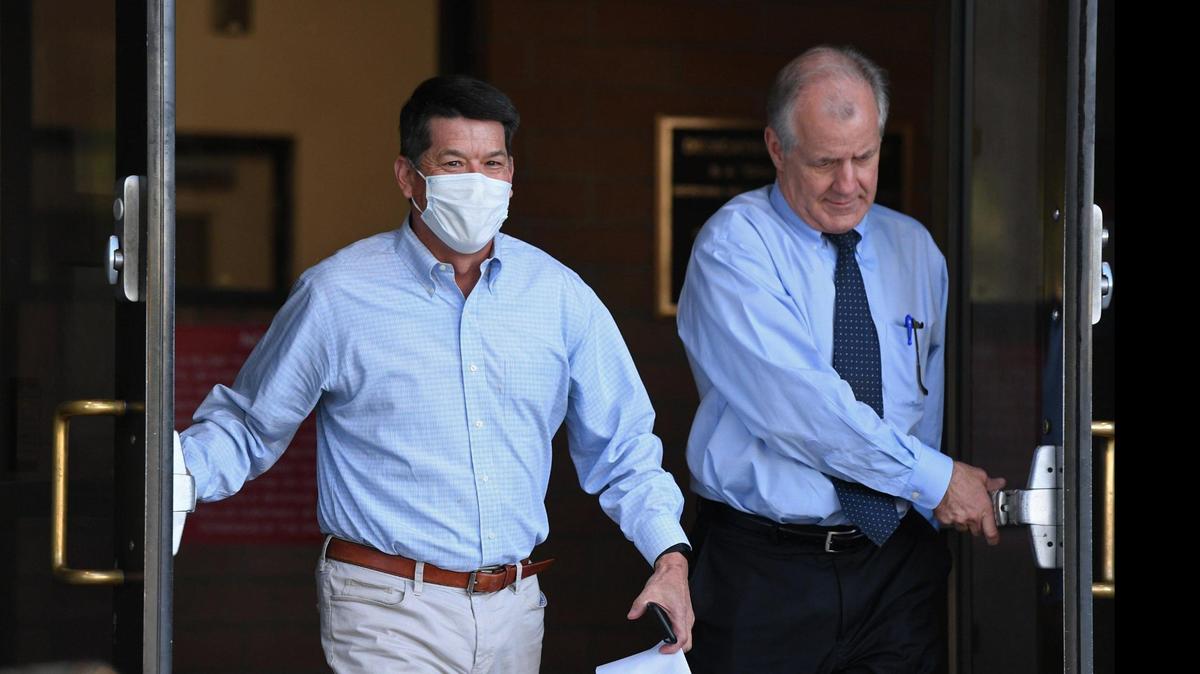Former Fresno Congressman Terrance John “TJ” Cox, left, leaves the Fresno County Jail with his attorney Mark Coleman to the right after pleading not guilty to federal charges Tuesday, Aug. 16, 2022 in Fresno.