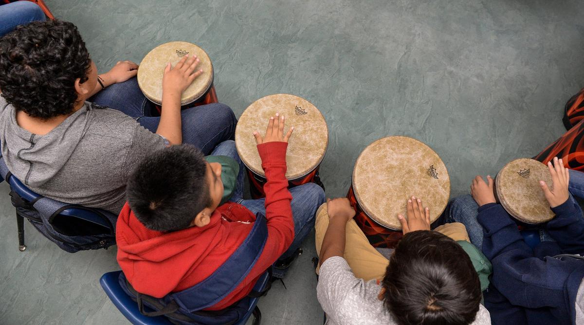 Sixth graders from Kirk Elementary School in southwest Fresno participate in a drum circle class on Wednesday, May 9, 2019.