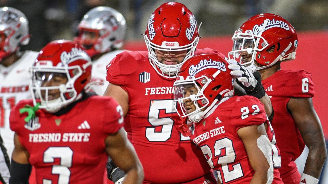 Fresno State running back Malik Sherrod (center, right), shown in a file photo, had a big Saturday while rushing for 138 yards and two touchdowns. But the Bulldogs lost 33-18 at San Diego State to drop a third straight game to end the regular season.