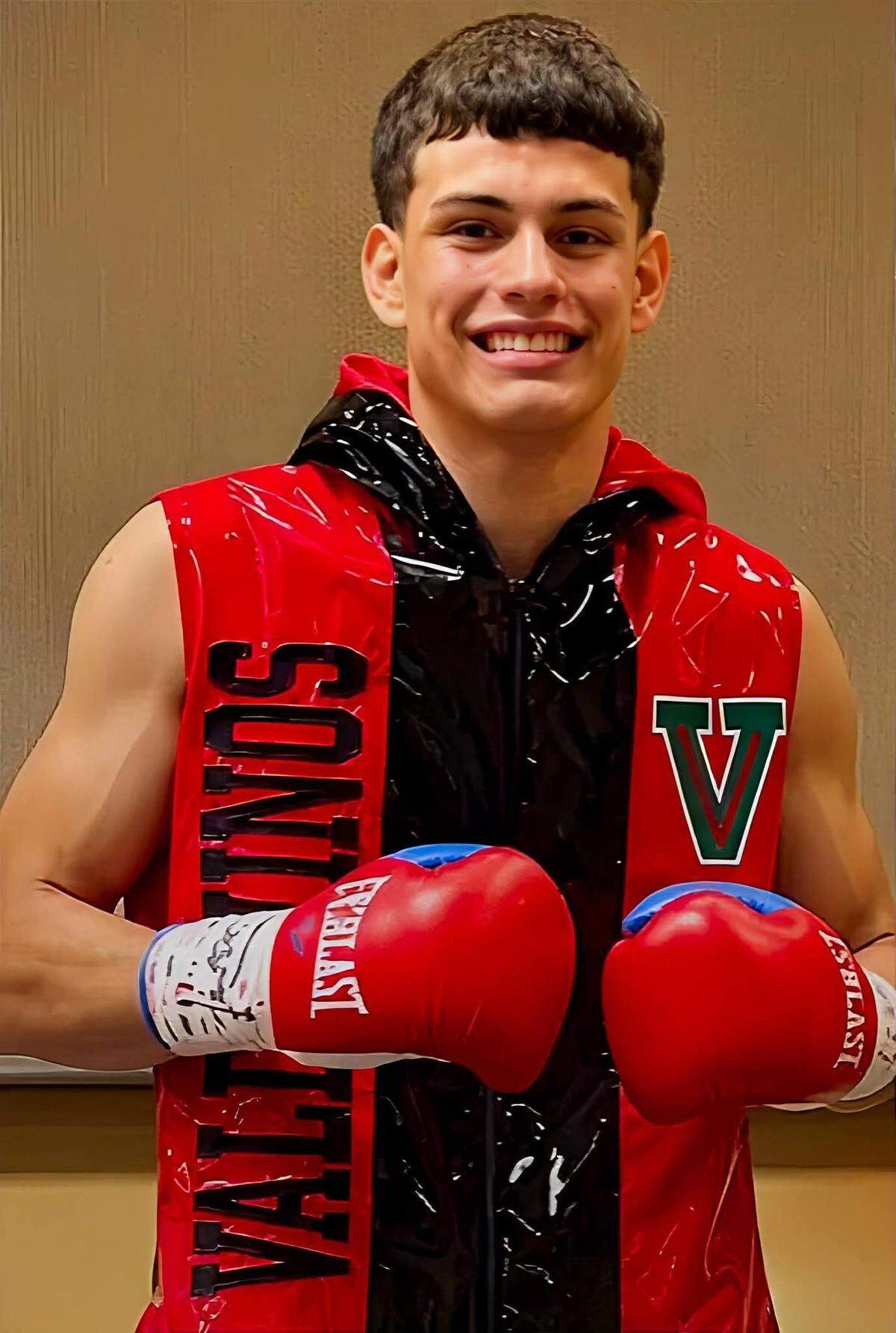 Hundreds gathered Wednesday night at the Hanford Civic Park for a candlelight vigil to remember 25-year-old Adrian Valdovinos, a young boxer victim of domestic violence.