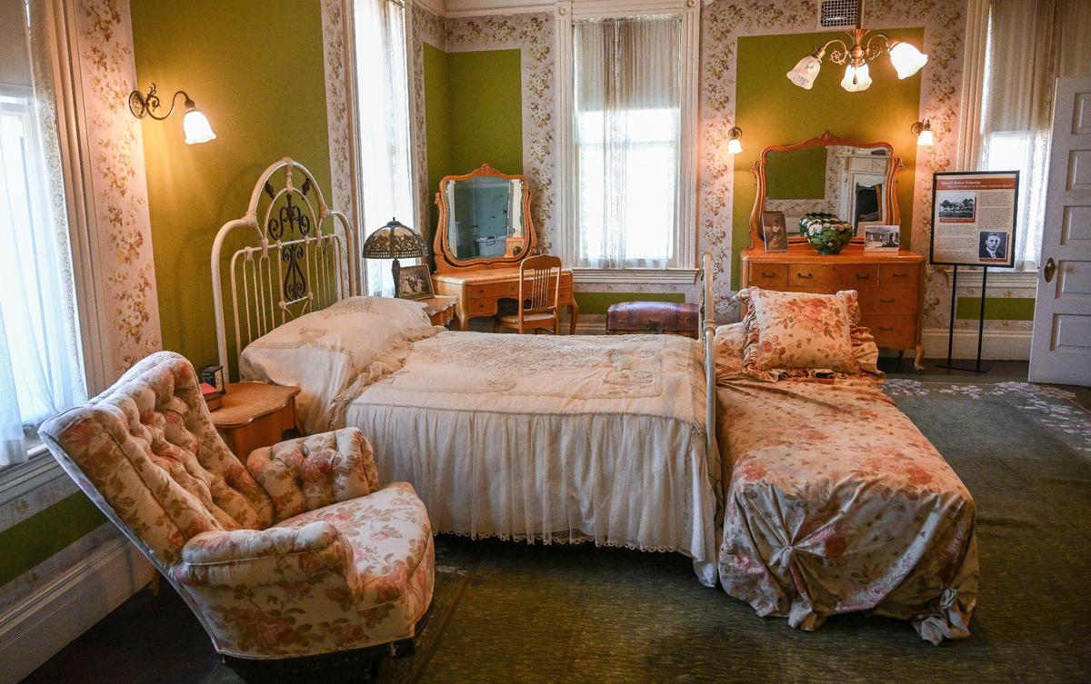A bedroom in the Kearney Mansion is displayed with furniture much like it would have looked at the turn of the 20th century.