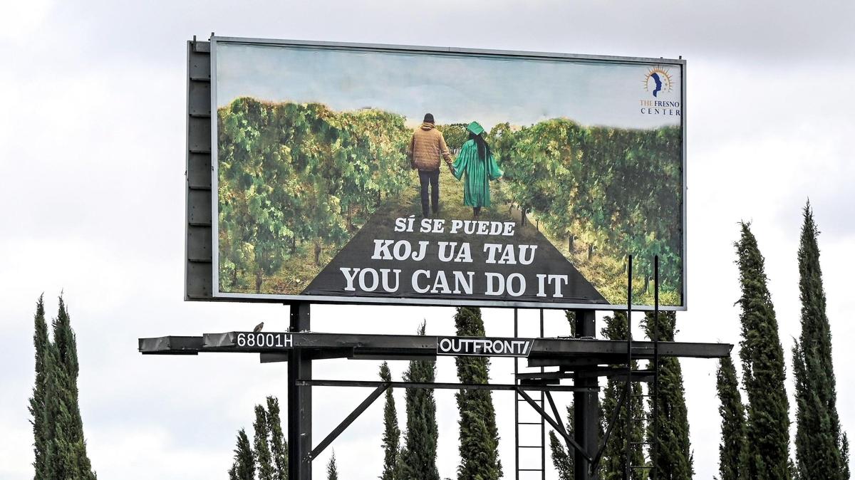 A billboard located on Clovis Avenue north of Olive showcases a project by a group of students that won a poster contest.