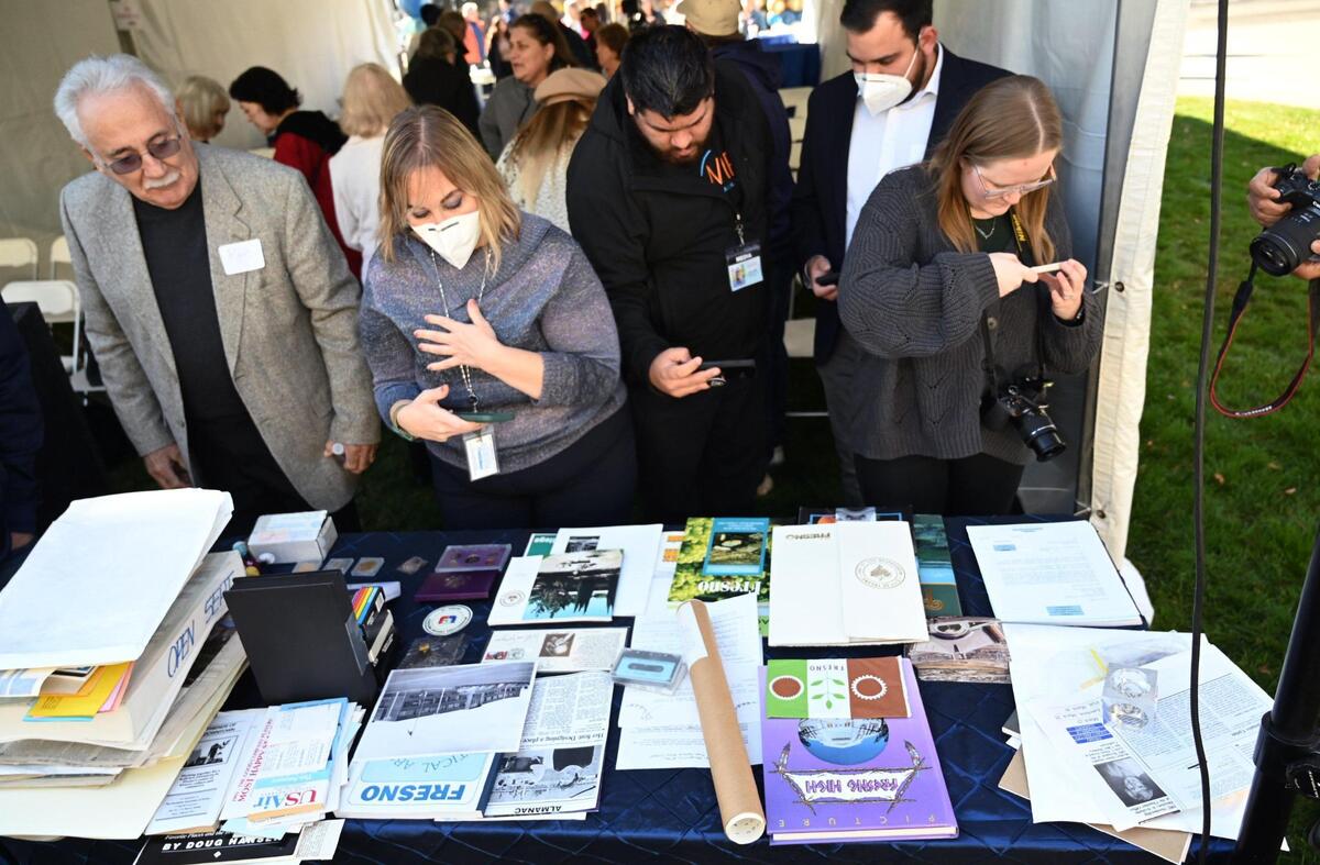 Items that had been sealed in a time capsule 30 years ago are seen on a table following a ceremony in front of City Hall Tuesday, Dec. 13, 2022 in Fresno. A new time capsule will be locked away and retrieved in another 30 years.