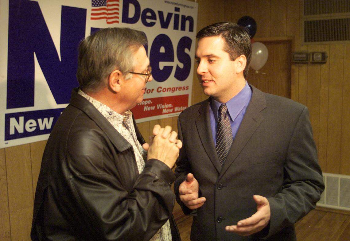 VISALIA 11/5/2002 SVB ELECTION 2002 DEVIN NUNES - (left to right:Bob Bignami, Devin Nunes) Chico dairy farmer Bob Bignami gets a minute with the candidate, Nunes, who he’s backed “since he was a small boy” on election night at the Portuguese Hall in Visalia, Tuesday. Congressional candidate Nunes is predicted to be the clear winner of the newly created 21st district. (Christian Parley - The Fresno Bee) Fresno Bee Staff Photo