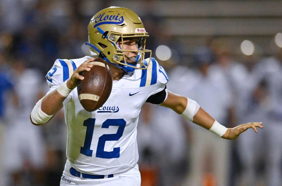 Clovis High quarterback Deagan Rose swings right to pass against Bullard Friday, Sept. 15, 2023 in Fresno.
