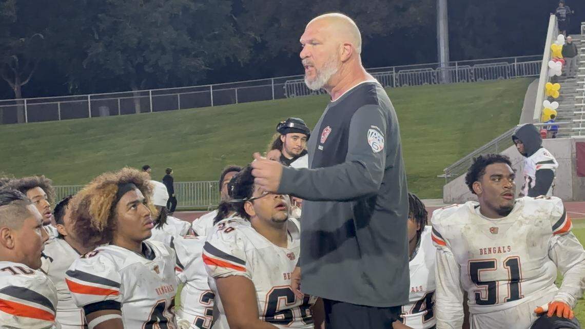 Central East head coach Kyle Biggs talks to his team after a 46-39 victory over Clovis West on Friday, Oct. 16, 2025.