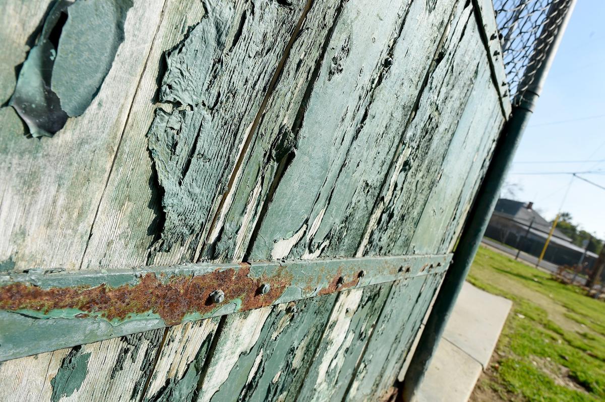 Rusted and peeling paint backstop of a Romain Playground baseball diamond, Tuesday Jan. 24, 2019.