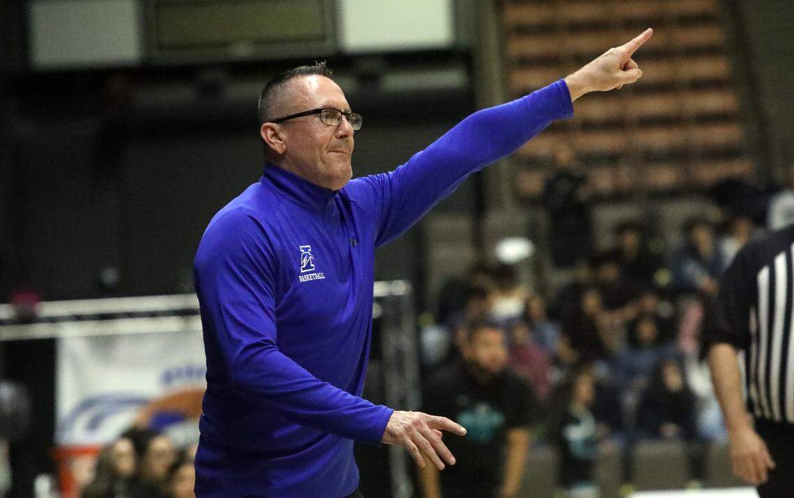 Immanuel High second-year coach Loren LeBeau directs his players in the closing minutes of their 41-29 win over Mendota High in the CIF Central Section Division IV championship game at Selland Arena on Feb. 23, 2024.