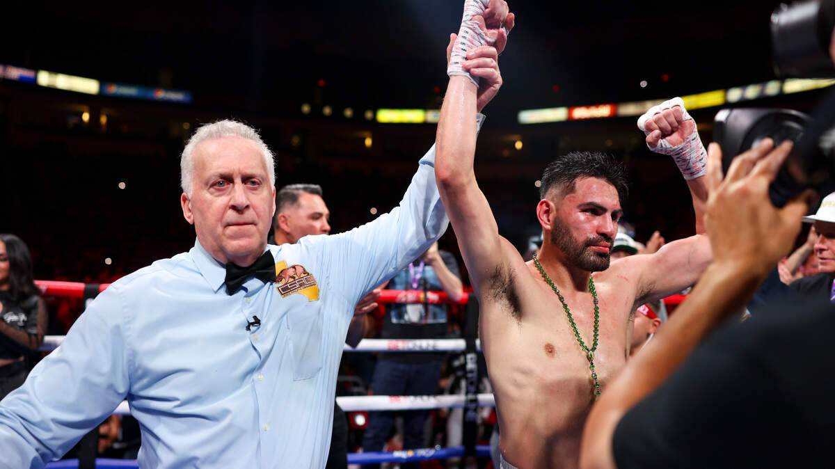 Jose Ramirez’s hand is raised after winning by unanimous decision at the Save Mart Center in Fresno, California on Saturday, April 27, 2024.