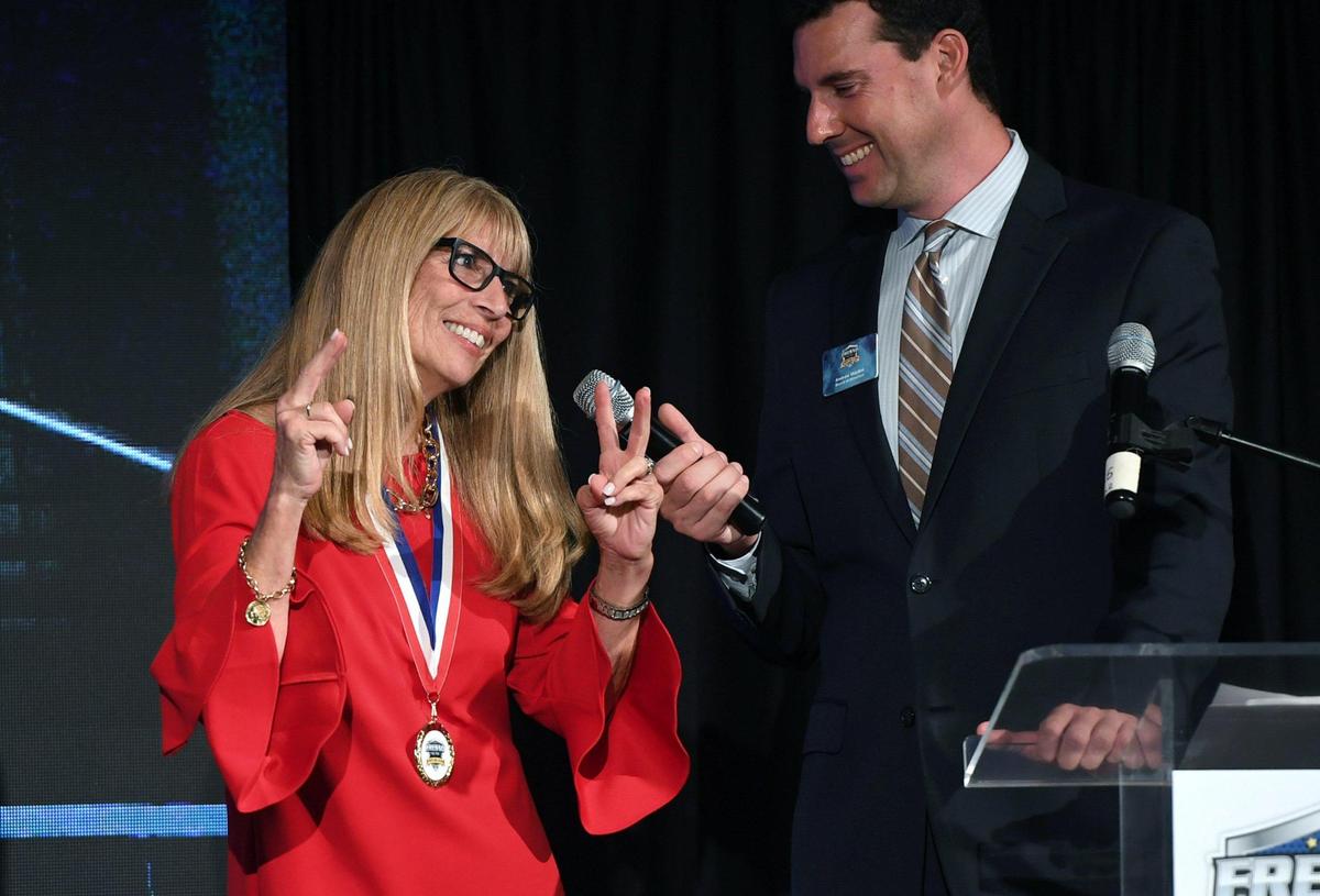 2022 inductee volleyball coach Marian Battles, left, is interviewed at the 63rd Annual Fresno County Athletic Hall of Fame Enshrinement Night Wednesday, Sept. 21, 2022 in Fresno. The event was also the grand opening in Athletic Hall of Fame’s new location inside the Save Mart Center at Fresno State.