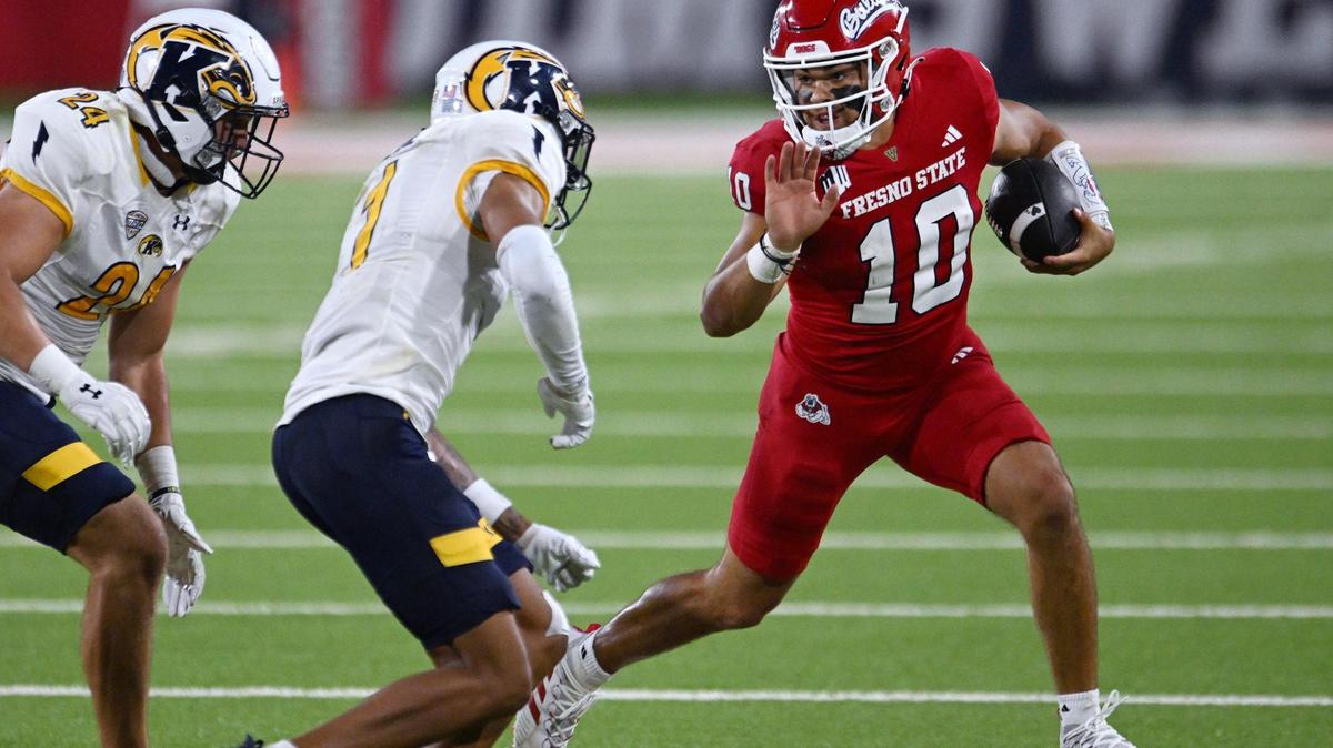 Fresno State quarterback Logan Fife, right, shown here in a file photo against Kent State on Saturday, Sept. 23, 2023 in Fresno.
