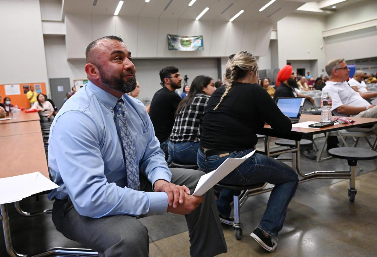 Fresno City College’s President Robert Pimentel listens to details outlining the new West Fresno Center campus during a meeting held at Gaston Middle School Thursday night, Oct. 20, 2022 in Fresno.