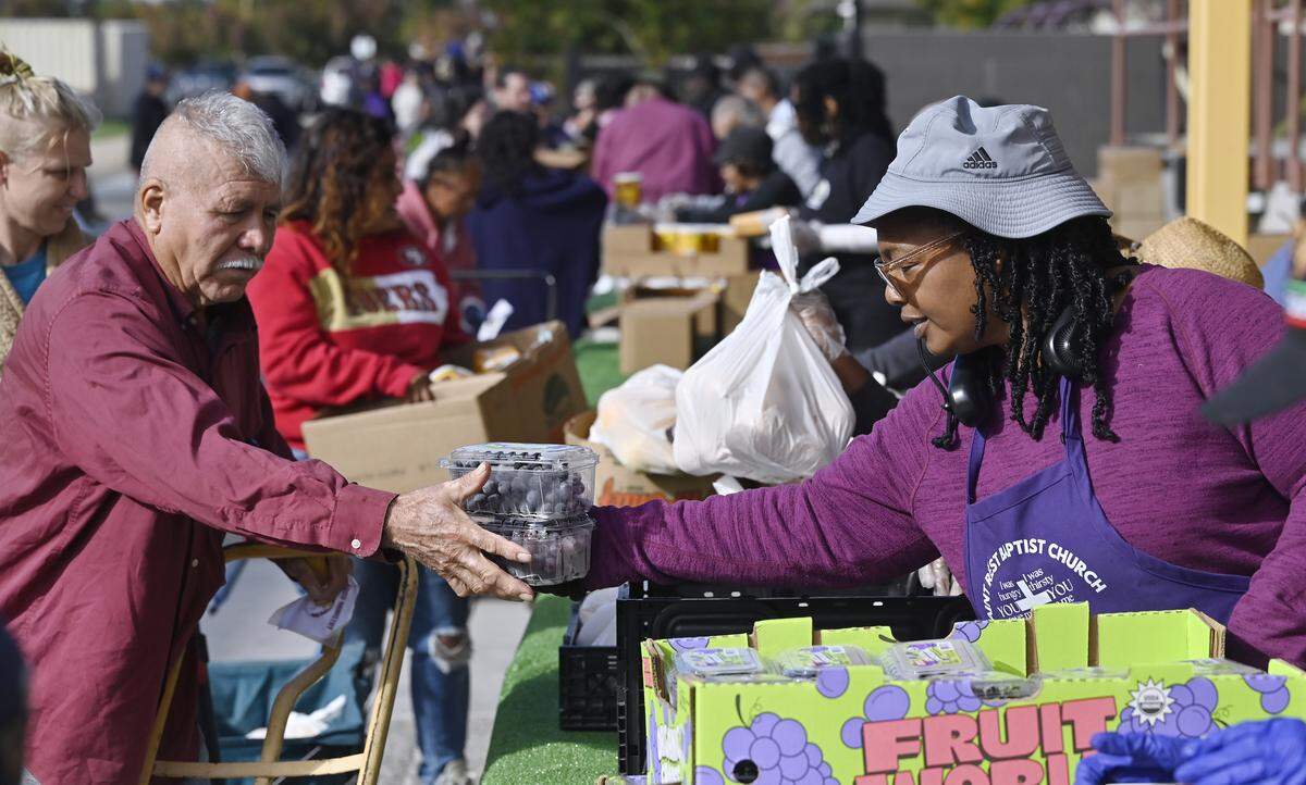 Food provided by the Central California Food Bank is distributed at Saint Rest Baptist Church Thursday, Nov. 6, 2025 in West Fresno.