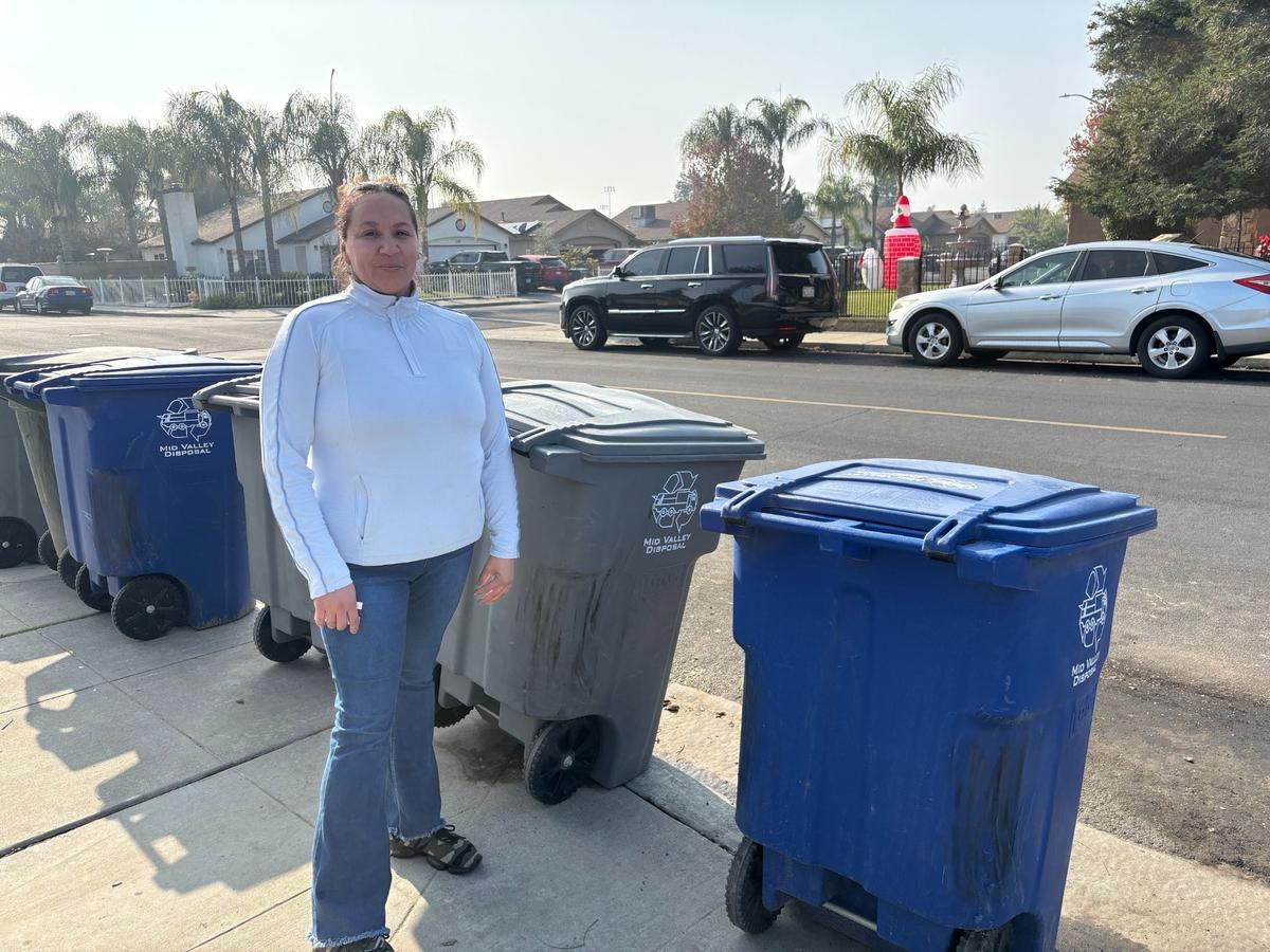 Parlier resident Norma Sandoval poses for a photo outside her home on December 6, 2025. She wants city leaders to focus on issues like illegal dumping and trash pickup.