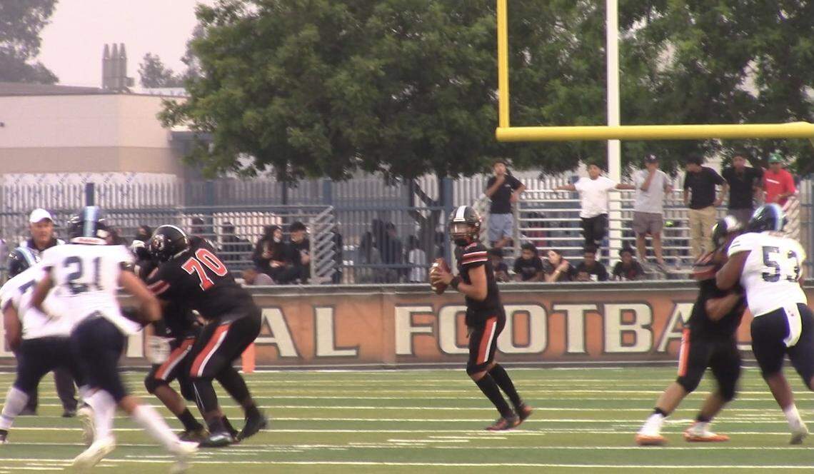 Central QB Dayton Tafoya looks to pass against Bullard in the season opening game at Deran Koligian Stadium on Friday, Aug. 20, 2021.