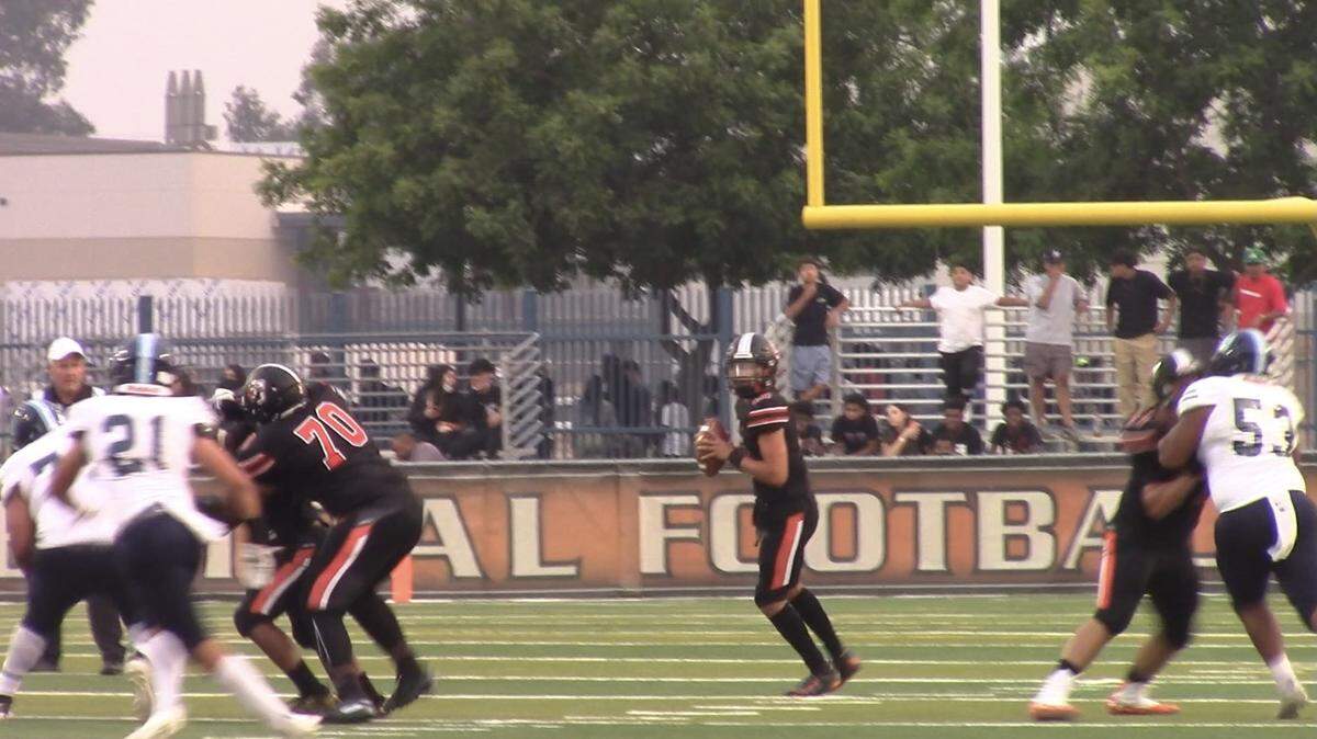 Central QB Dayton Tafoya looks to pass against Bullard in the season opening game at Deran Koligian Stadium on Friday, Aug. 20, 2021.