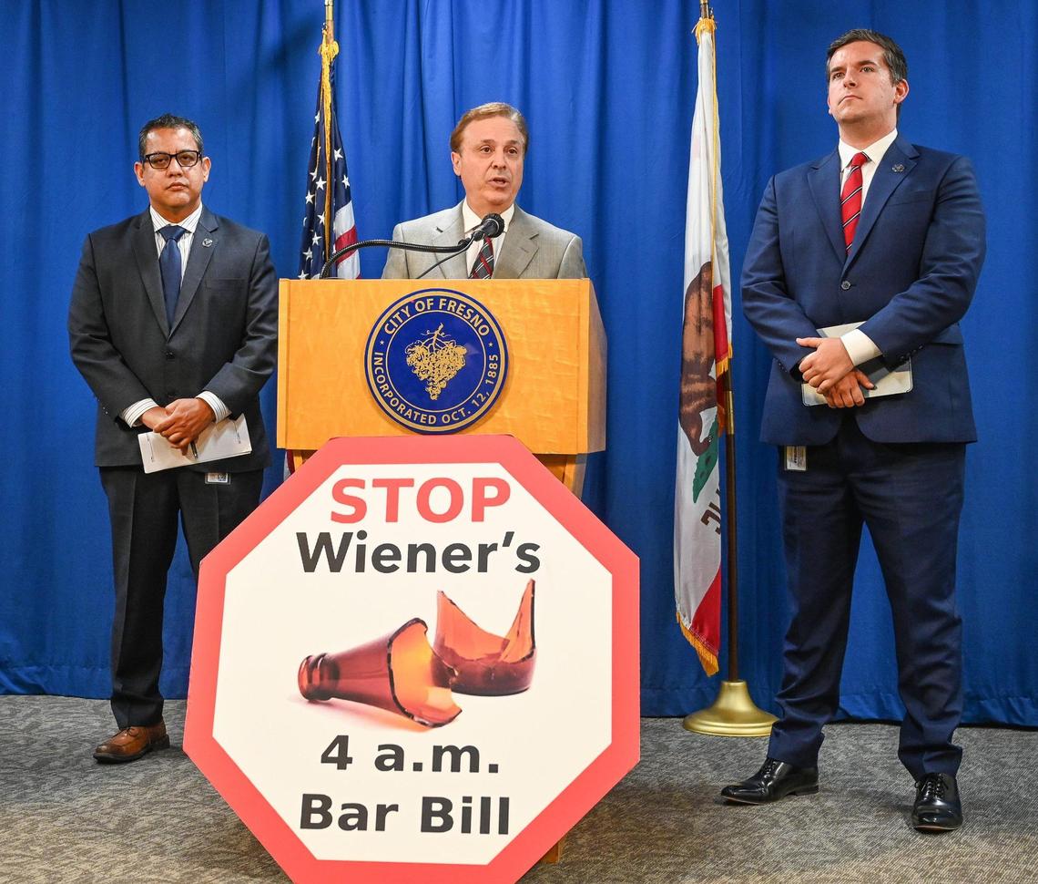 Fresno City Councilmember Garry Bredefeld, center, speaks out against Senate Bill 930, joined by council colleagues Miguel Arias, left, and Tyler Maxwell at Fresno City Hall on Tuesday, Aug. 9, 2022. SB 930 would extend last call at bars to 4 a.m. at bars in participating pilot cities in California.