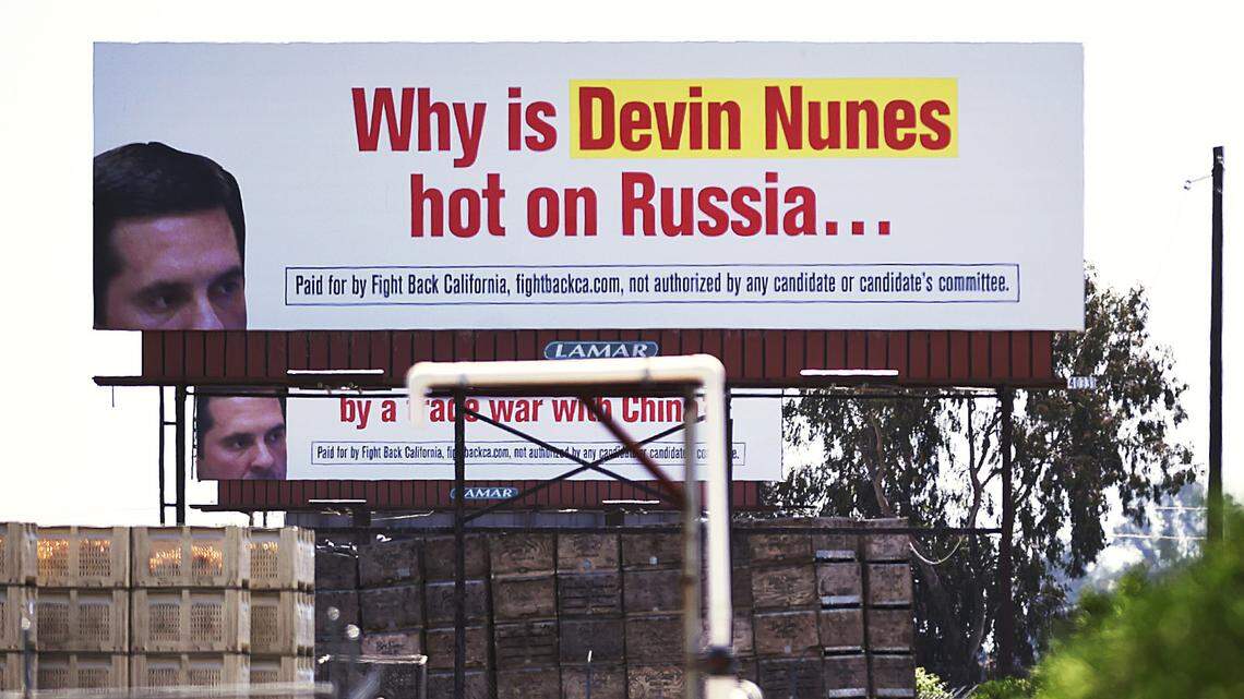 Two of three billboards directed at Devin Nunes can be seen along Highway 99 Thursday, May 24, 2018 near Fowler.