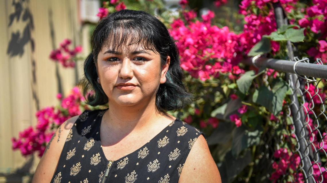 Yenifer Gallegos-Mejia used to work with the Fresno County Department of Social Services, but quit her job in June. A significant contributing factor in her decision, she said, was what she described as the lack of response to COVID-19 by county officials. Employees say there are several inconsistencies in guidelines, a disregard for employees’ health, a lack of transparency on workplace exposure, and a lack of PPE. Photo taken in Kerman on Friday, Aug. 28, 2020.