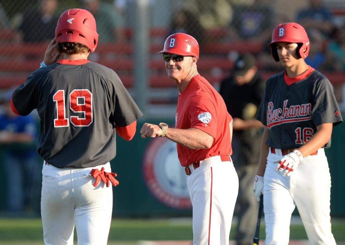 FILE. Tom Donald, center, was the Buchanan High baseball coach for 20 years. Now, he’s the Bullard coach and will face his former team on Thursday, April 8, 2021.