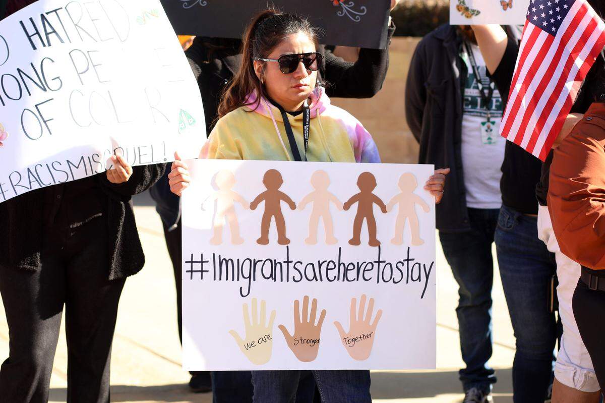 A broad coalition of immigrant rights, legal and community organizations during a press conference at the Federal Building in downtown Fresno on Nov. 8, 2024, to share their reactions to election outcomes as well as commitments to protect vulnerable communities.