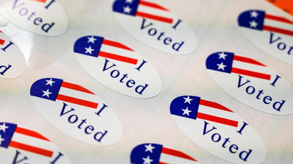 Mass-produced “I voted” stickers await voters at the Fresno County elections office in downtown Fresno on Monday, Nov. 7, 2022.